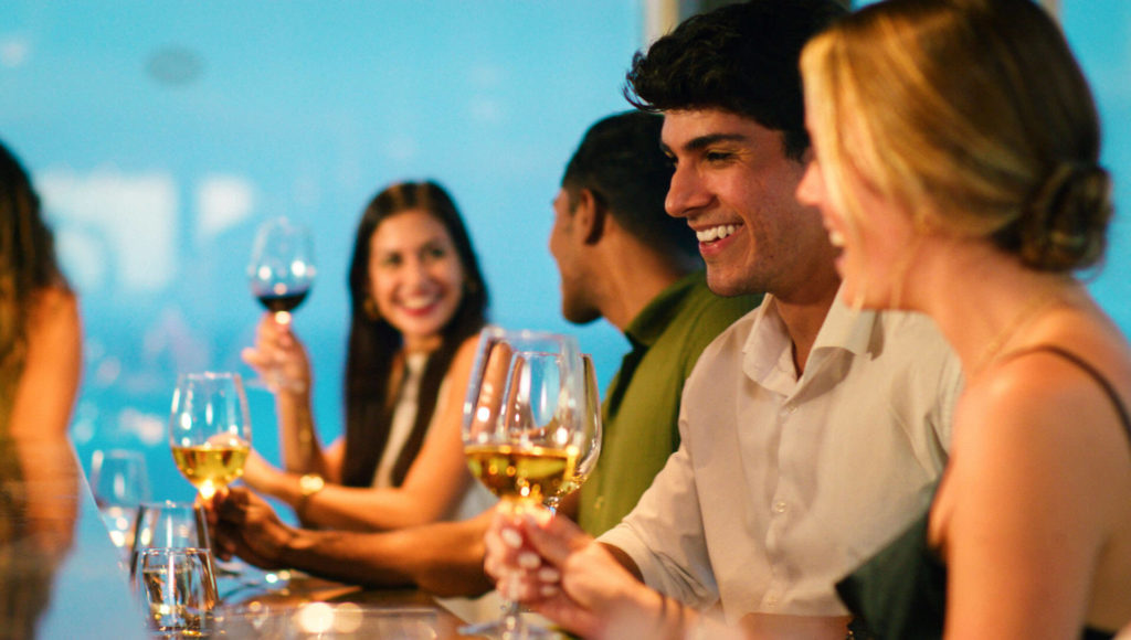People smiling at a resort dinner