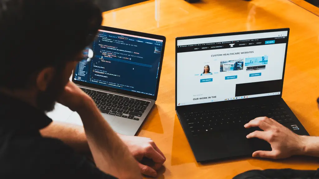 A website designer and developer optimizing a site design for SEO