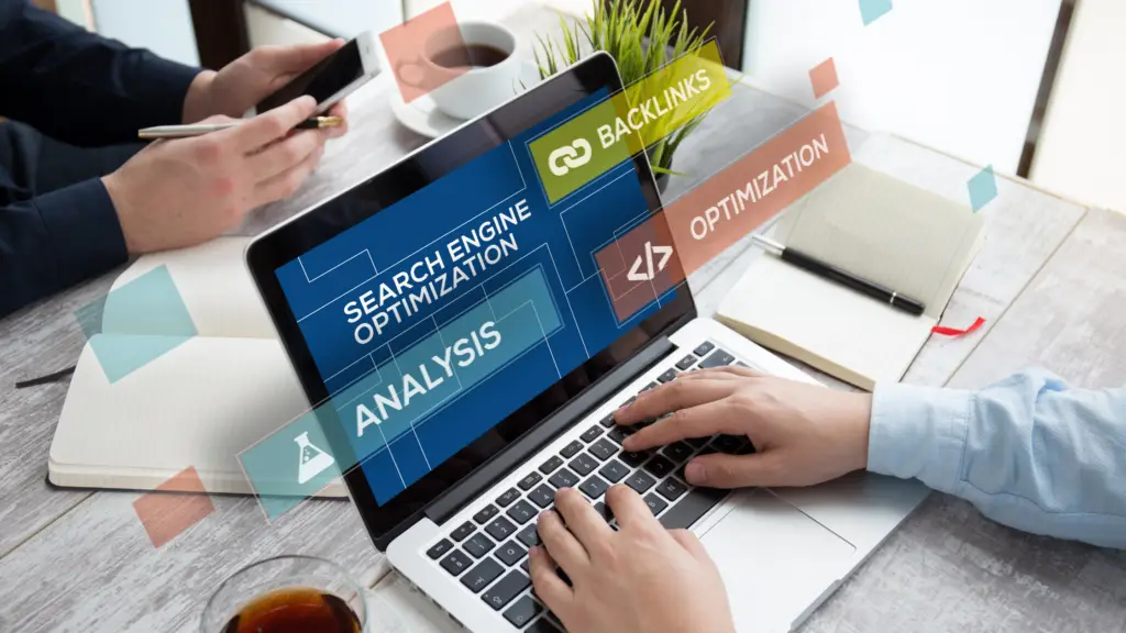 Hands typing on laptop with the words "Search Engine Optimization," "Backlinks," "Analysis," "Optimization"