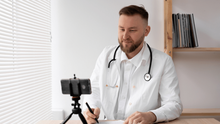Healthcare professional filming himself with a phone for a social media post