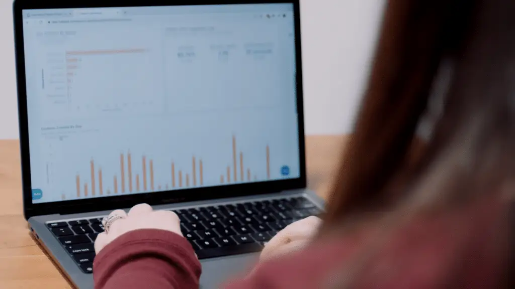 Marketer looking at healthcare marketing statistics on screen