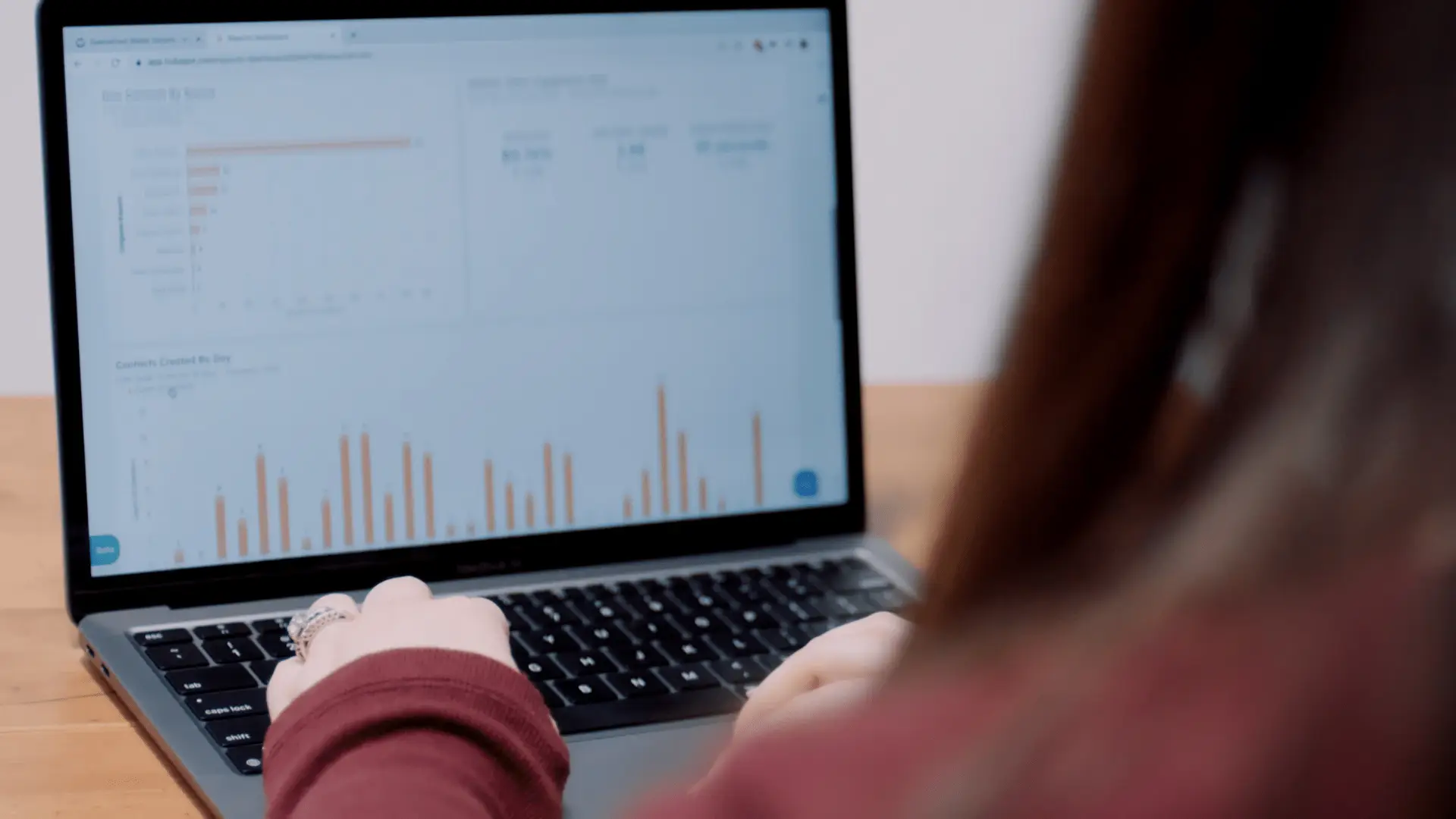 Marketer looking at healthcare marketing statistics on screen
