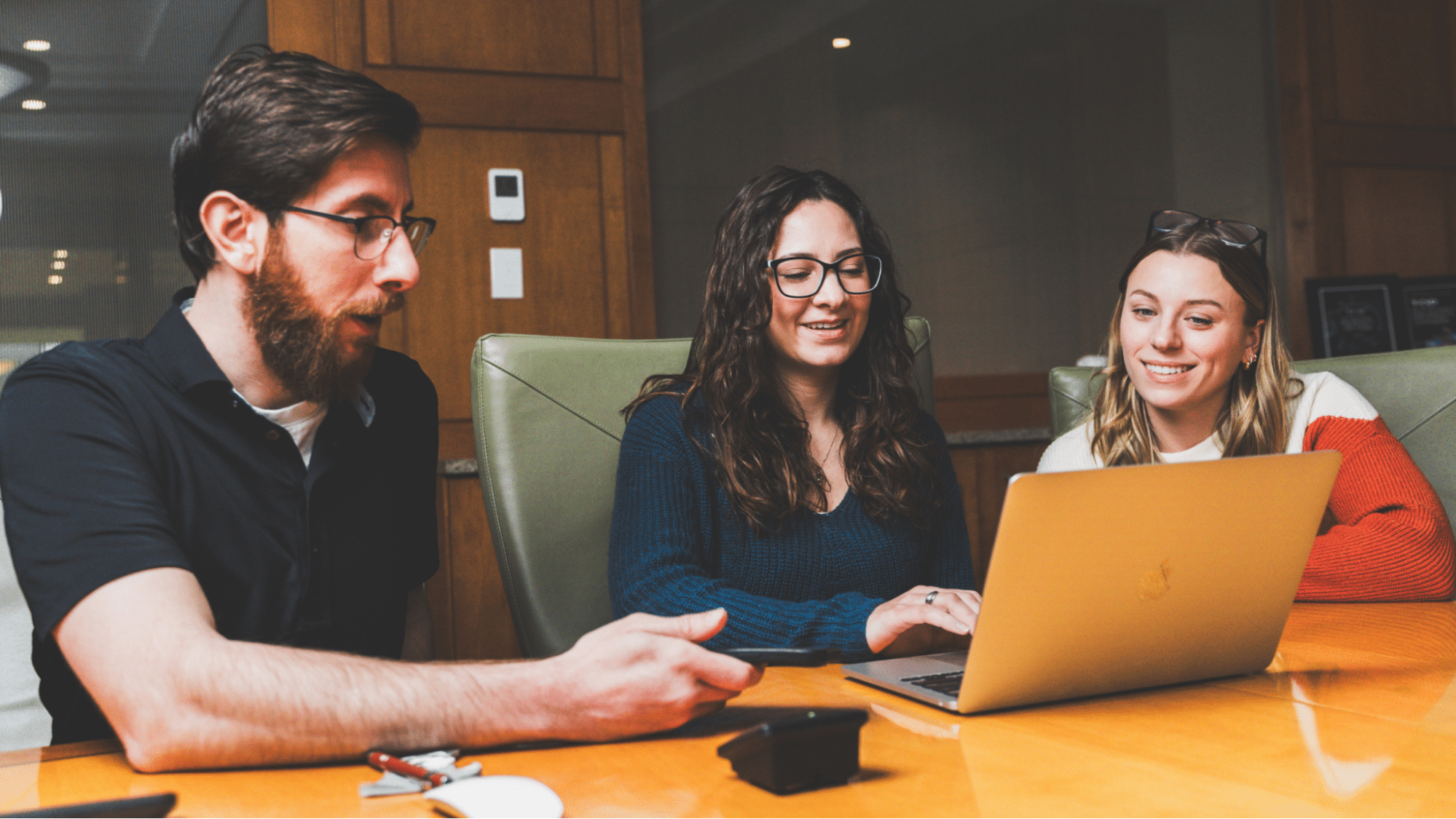 SEOs looking at a website on a laptop