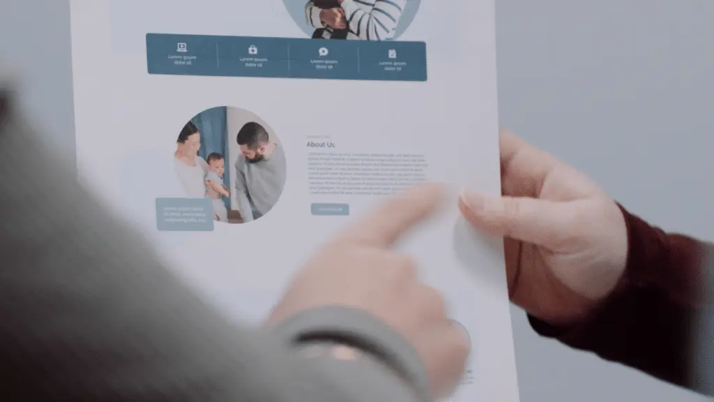 Website designer reviewing a design with a client