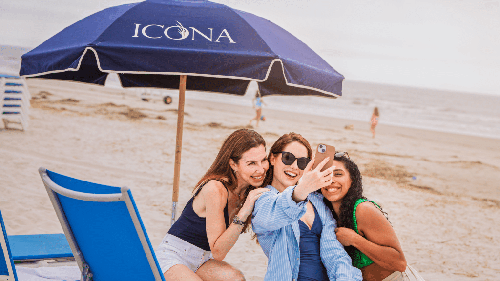 People at a hotel taking a photo for social media