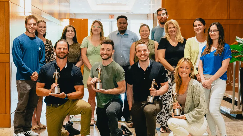 Forge employees posing with 2023 Telly Awards