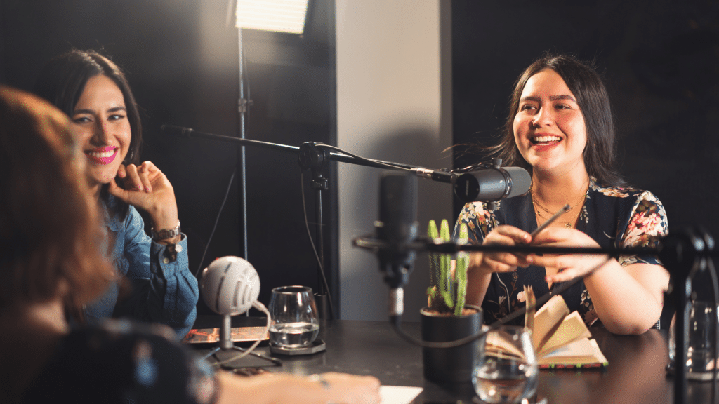 People in a podcast studio