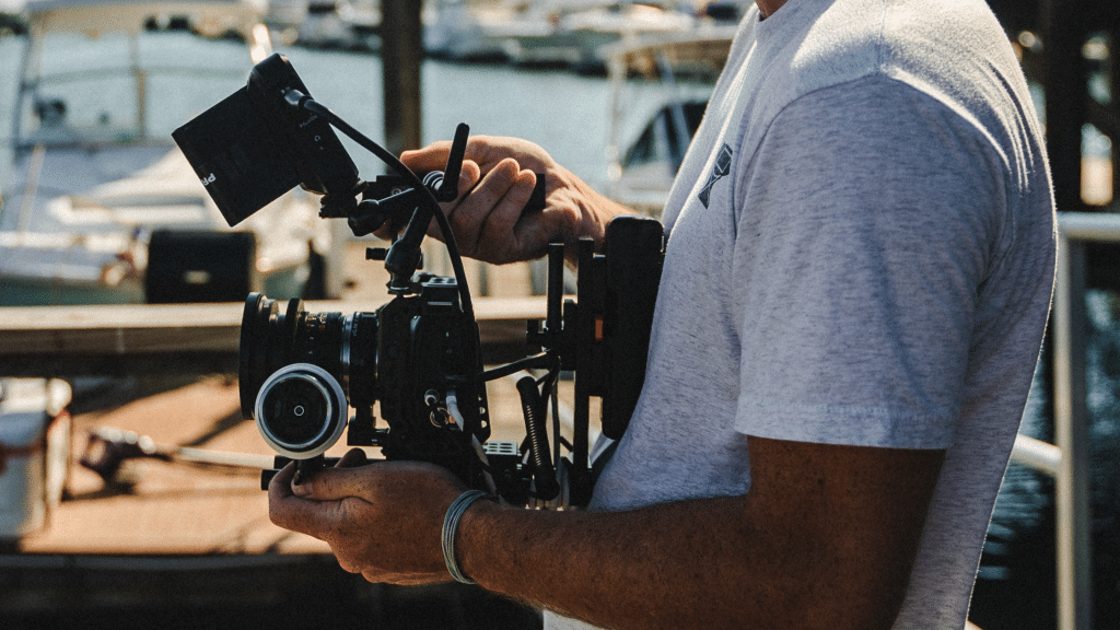 Videographer holding a camera