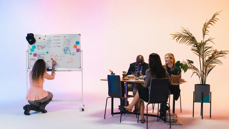 A corporate marketing team meeting about corporate video ideas