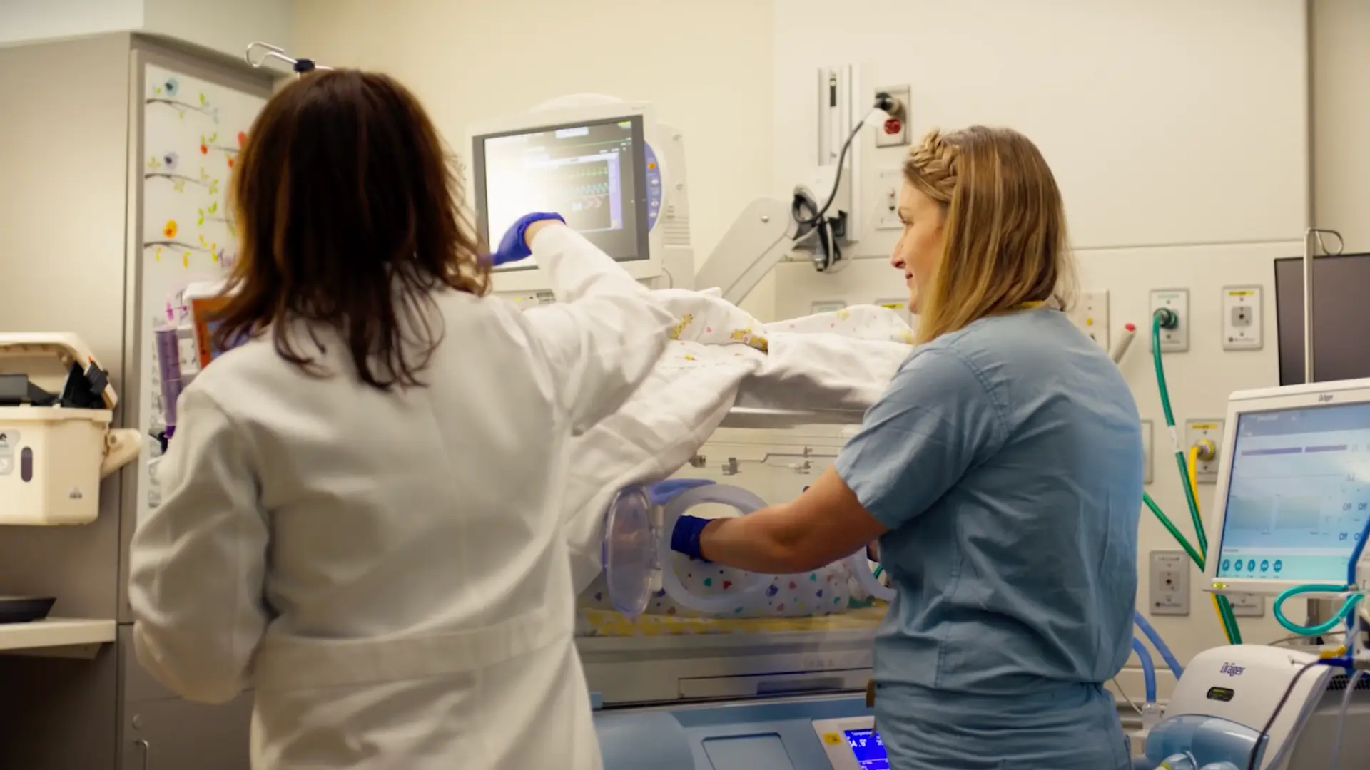 Two medical professionals working in Chester County Hospital's NICU