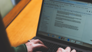 image of someone typing on a computer